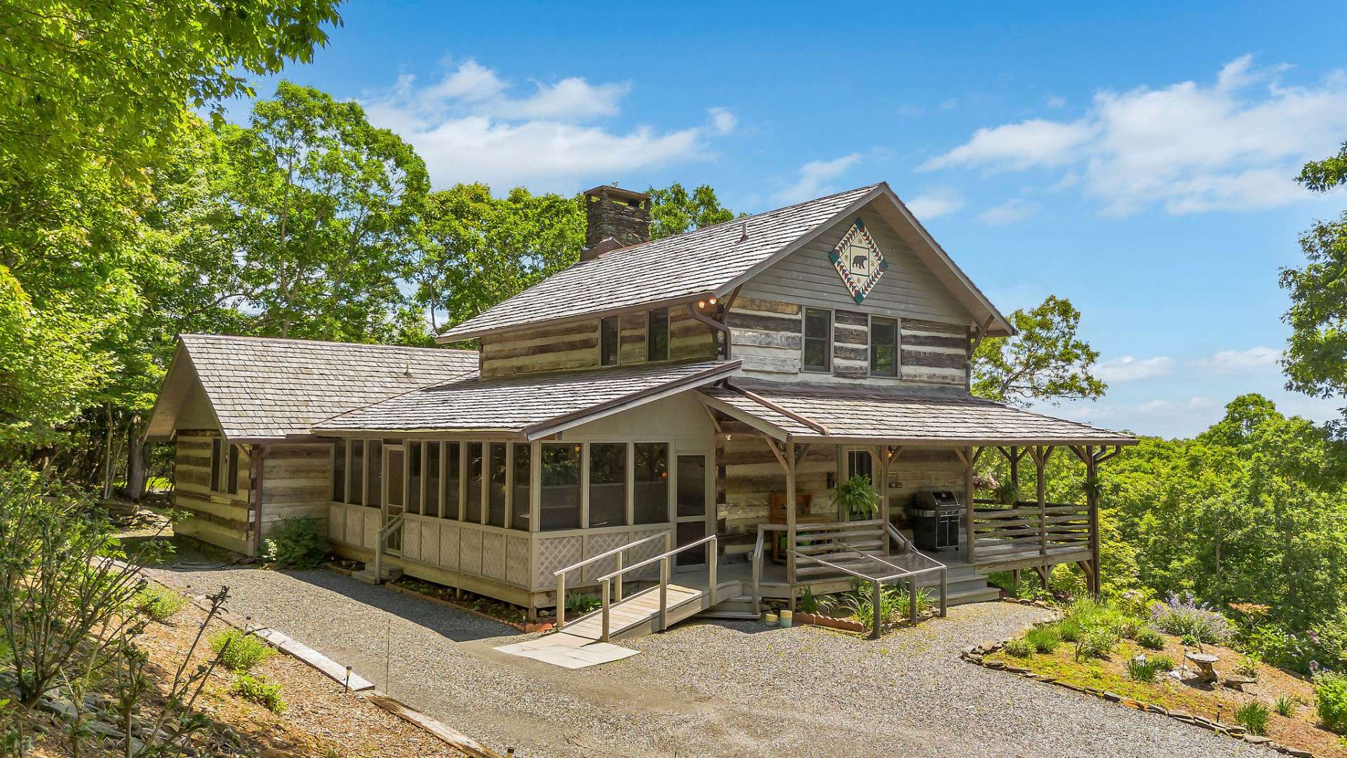 With plentiful parking and abundant outdoor spaces, this home becomes the ideal summer social hub.