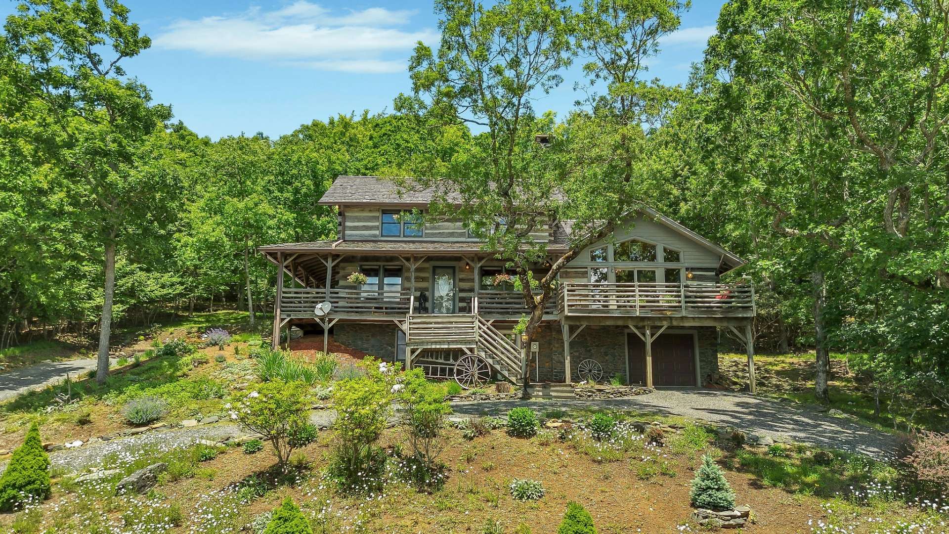 Here, amidst the embrace of nature's grandeur, behold the breathtaking vistas of Grandfather Mountain beckoning from your very own front porch.