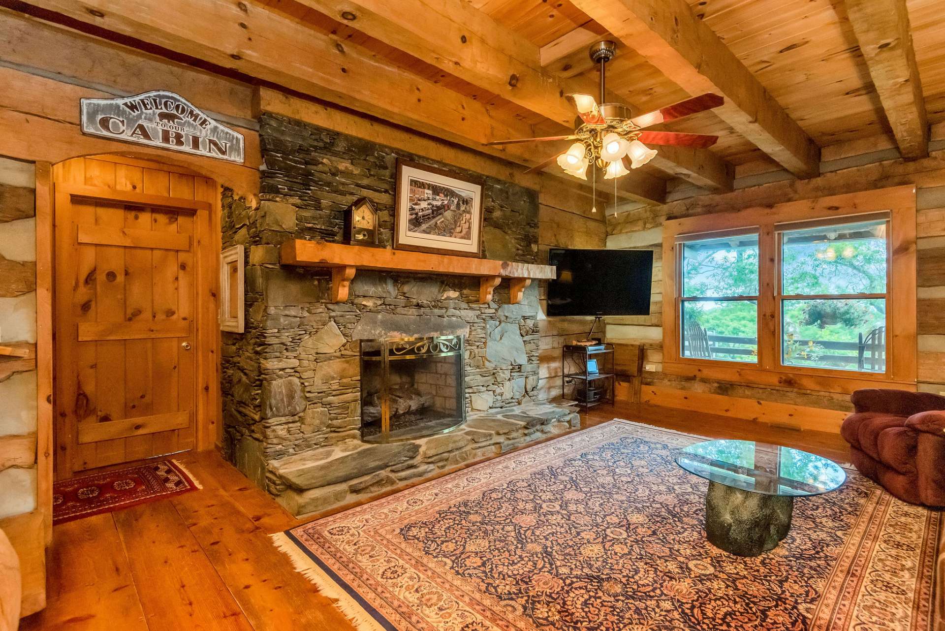 You will enjoy the ambiance and warmth of this stone fireplace on cool winter evenings.