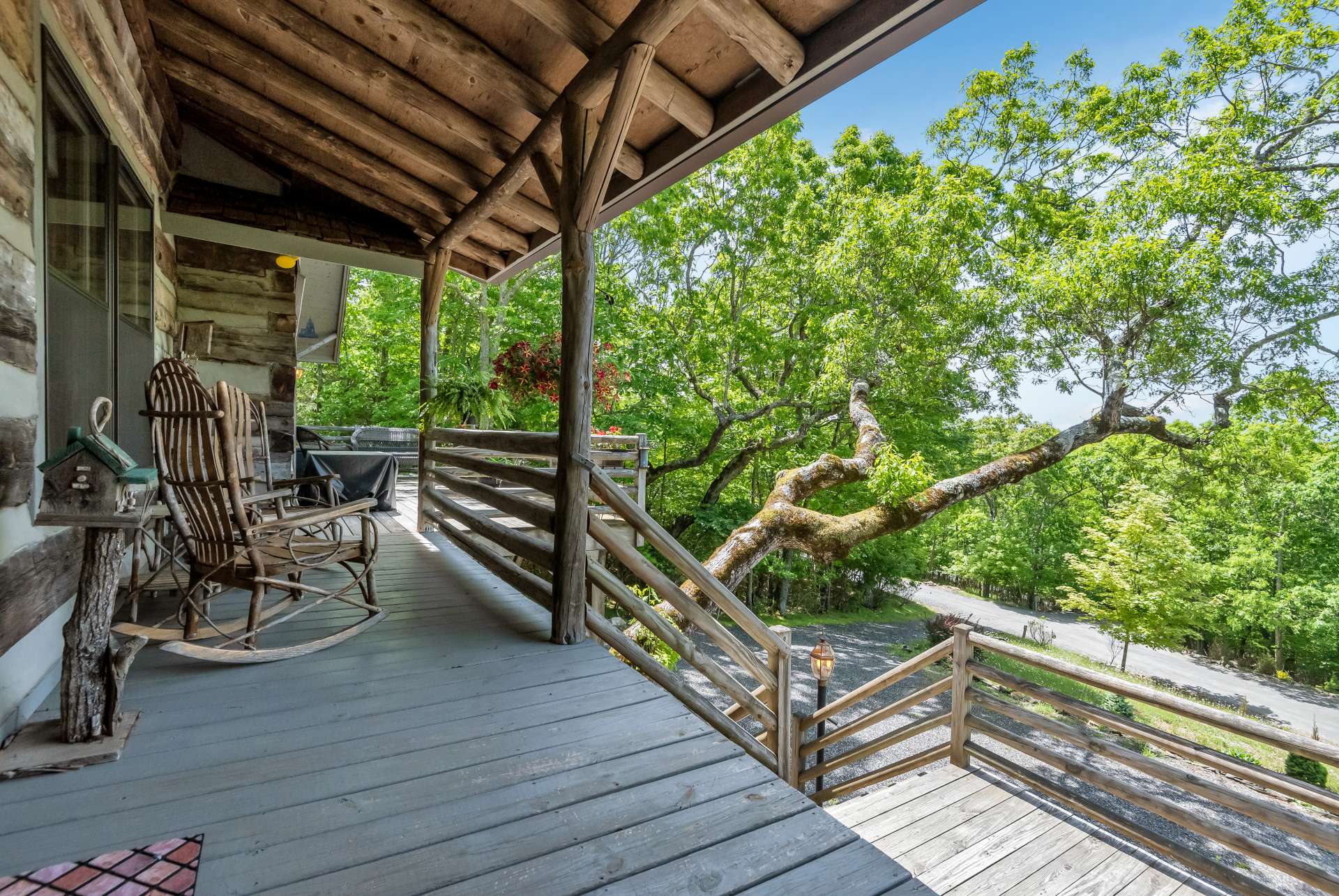 Delight in the picturesque views from both covered and open porches.