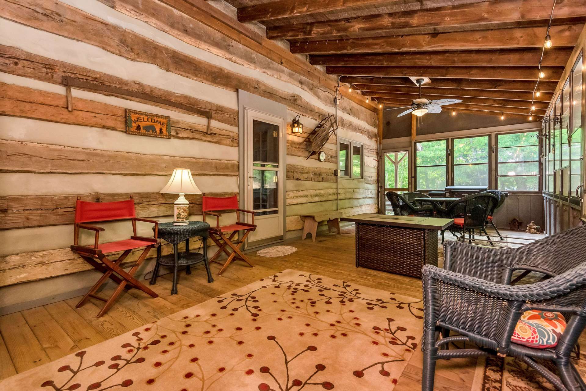 Entertain guests on the screened-in porch, where the gentle mountain breeze whispers tales of adventure and serenity.